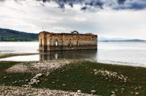 Picture of abandoned ruins at the edge of a lake