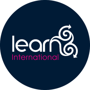 learn international logo, 2019 edition. navy background with international colored in pink