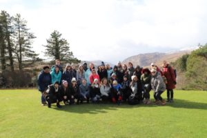 Group of study abroad students gather for a picture in the sun in Donegal, Ireland