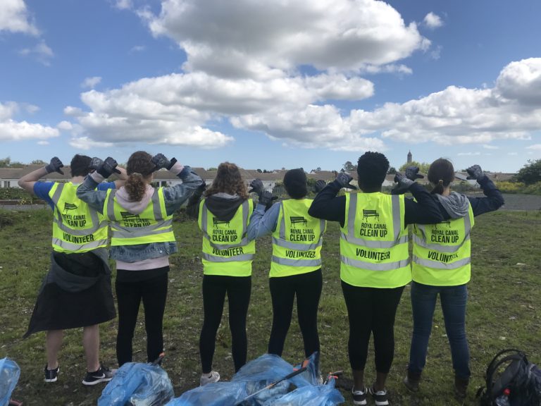 a group of dublin study abroad students pose together in reflective vests